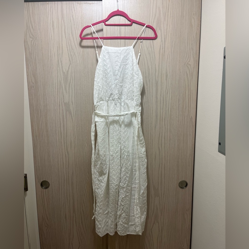 White jumper with open back